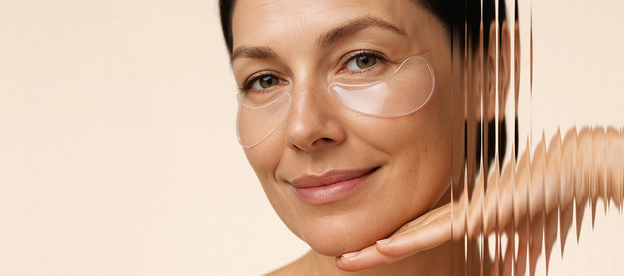 Women smiling while wearing reusable silicone eye patches for wrinkles and crows feet – Bare Intent