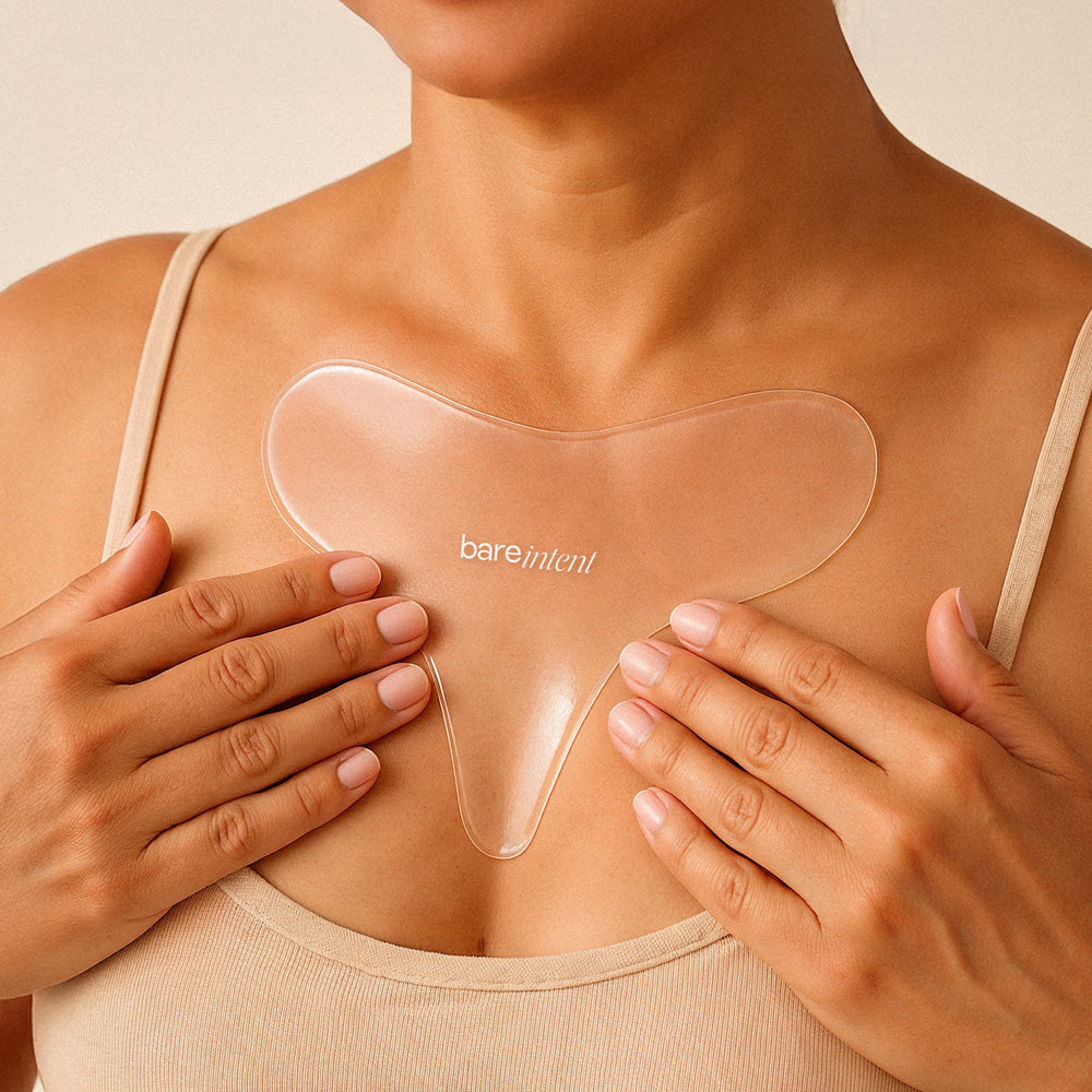 Close up of woman wearing reusable chest patch for wrinkle-smoothing treatment, targeting chest creases, sleep lines and cleavage lines – Bare Intent minimalist skincare